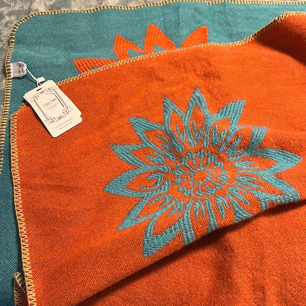 Beautiful wrap for fall nights, orange and teal. New with tags